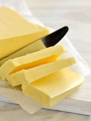 Butter being sliced.