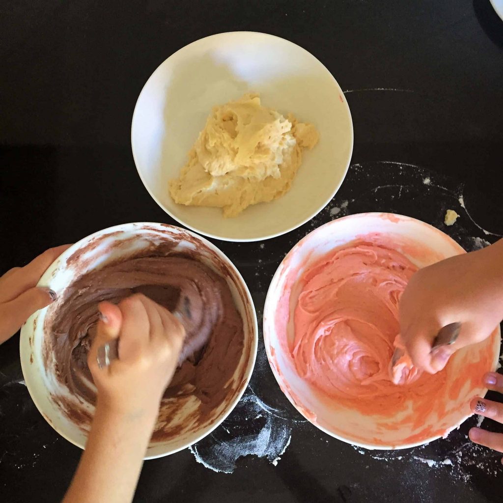 stirring colours for neapolitan cake