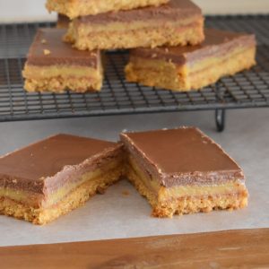 caramel slice squares on baking paper