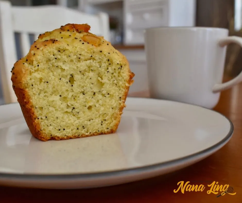 sliced piece of orange and poppy seed muffin