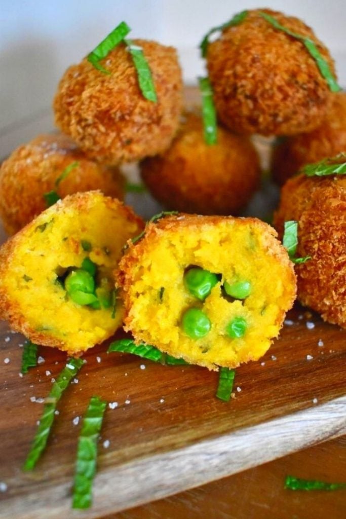 pumpkin croquettes sitting on serving board