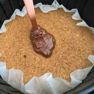 pouring icing over hot base