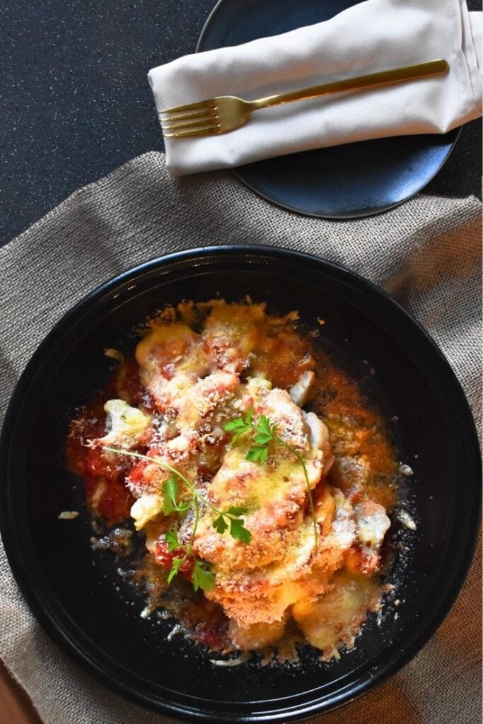 smothered cauliflower in baking dish