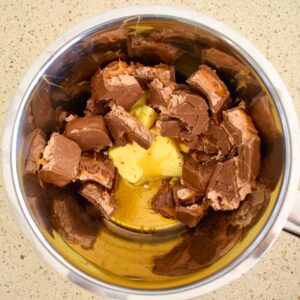 mars bar slice ingredients in saucepan