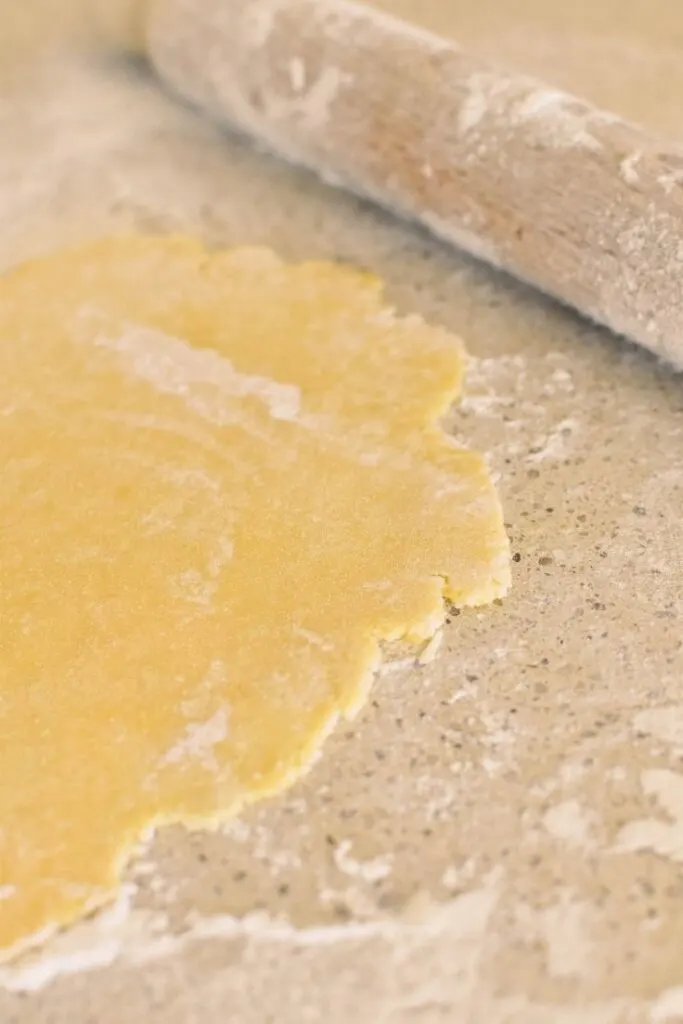 rolling out sweet shortcrust pastry