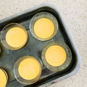 creme caramels in baking tray