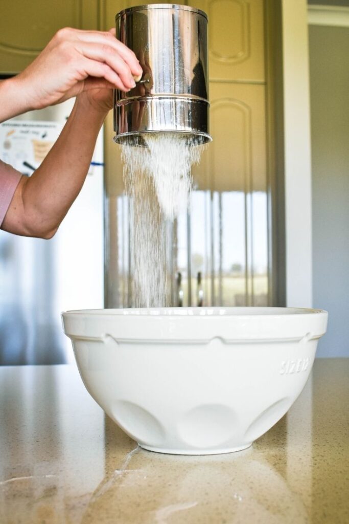 sifting flour for damper