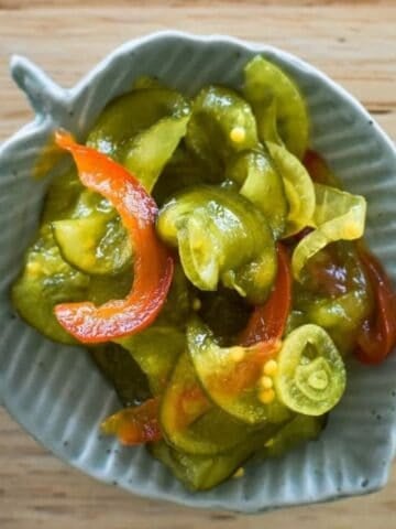 Bread and Butter Pickles in a small dish.