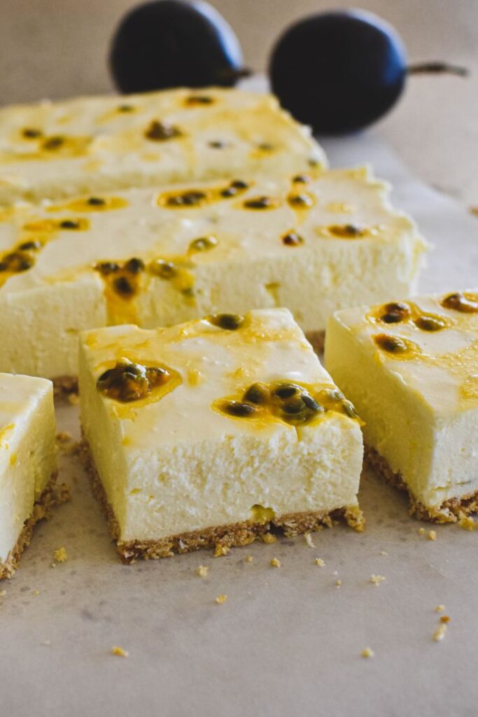 cutting up passionfruit cheesecake slice