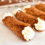 brandy snaps on plate.