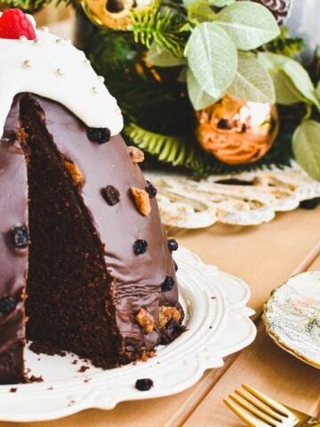 christmas pudding cake on plate with slice