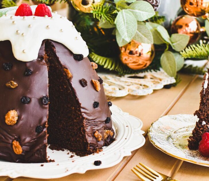 christmas pudding cake on plate with slice