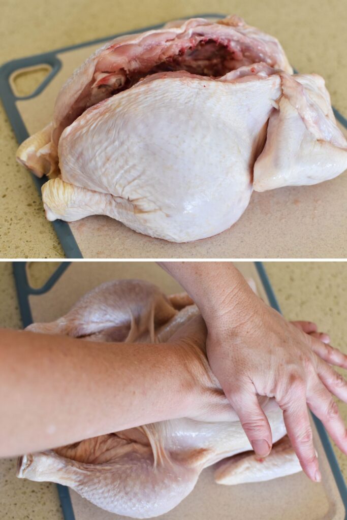 flattening the butterflied chicken with palms.