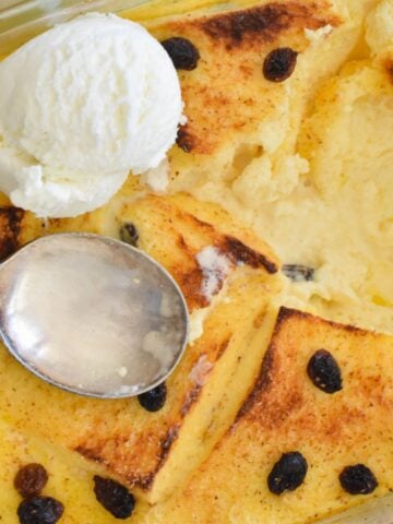 bread and butter pudding served with ice cream.