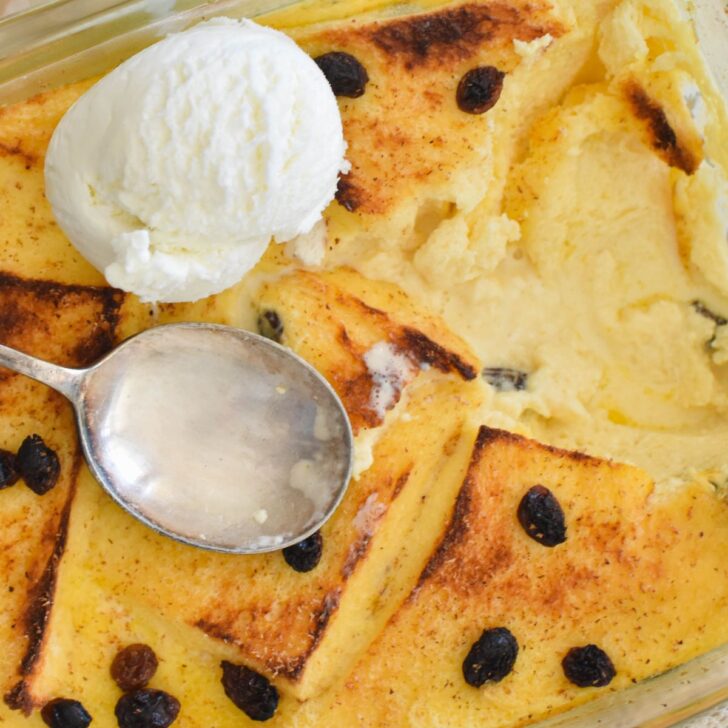bread and butter pudding served with ice cream.