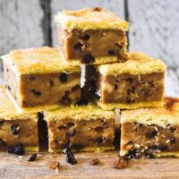 Chester cake squares on plate.