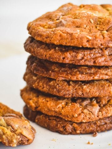 muesli cookies stacked on plate.