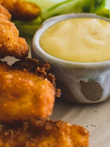 honey mustard sauce in condiment bowl.