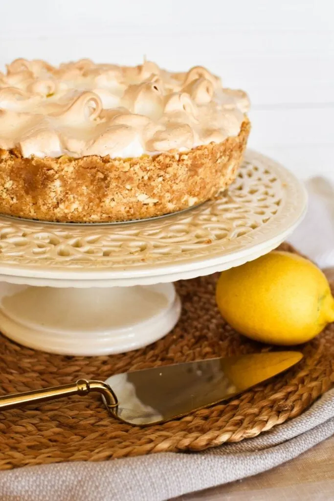 lemon meringue pie on cake stand.