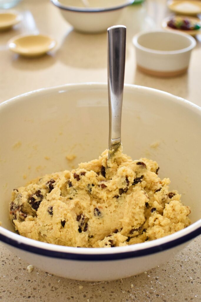 mixing together rock cake dough.