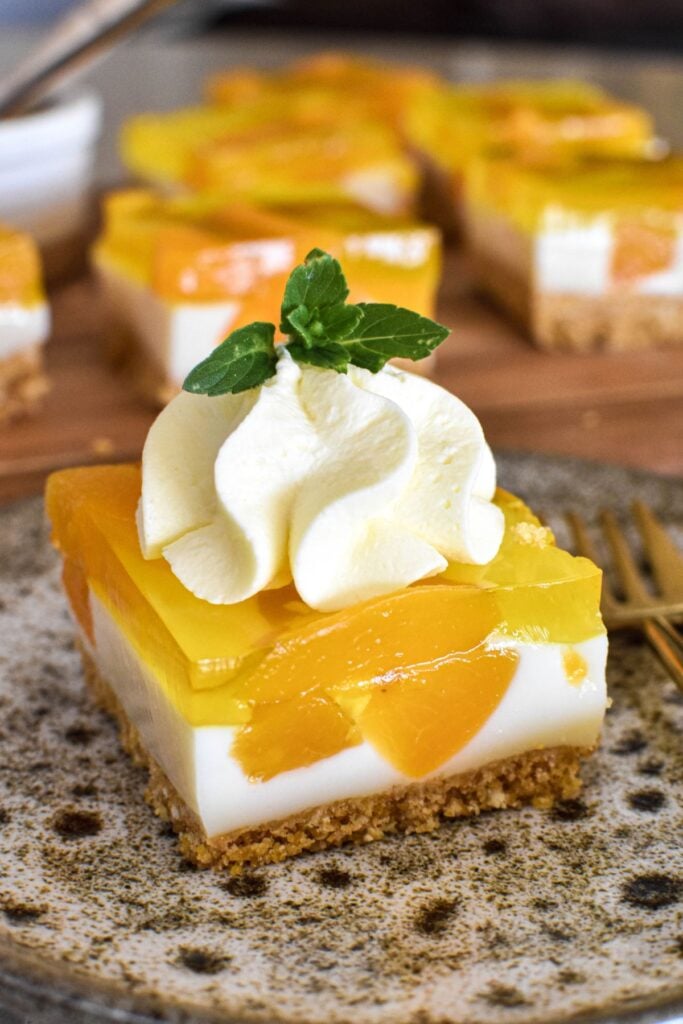 peach slice served with cream.