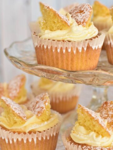 butterfly cakes on cake stand.