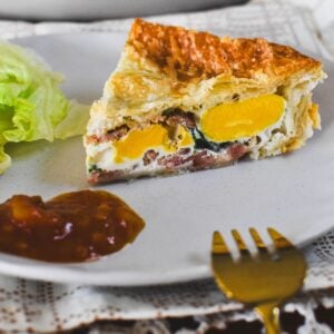 egg and bacon pie on plate.