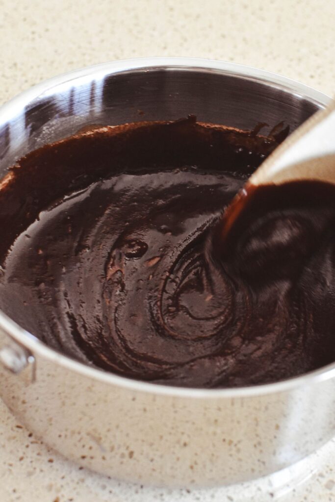 stirring chocolate fudge.