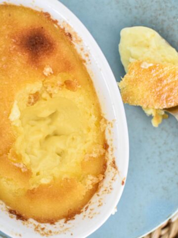 coconut custard on plate with scoop on spoon.