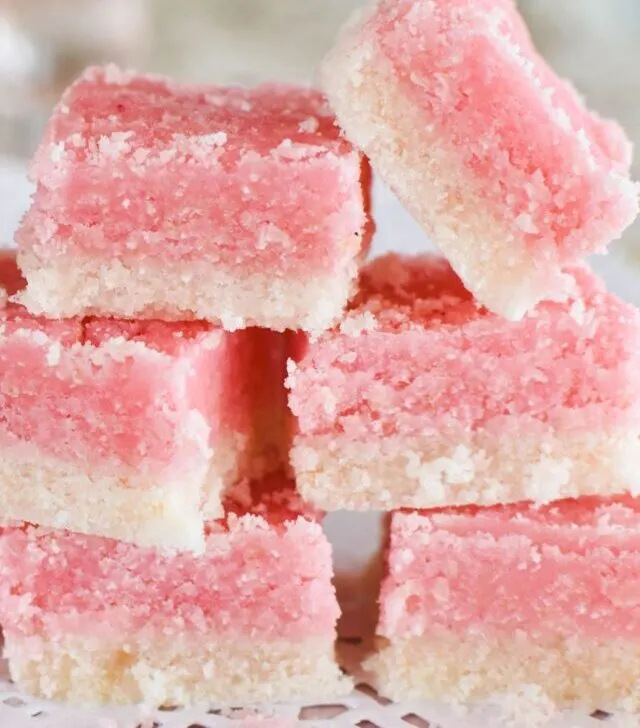 coconut ice stacked on plate.