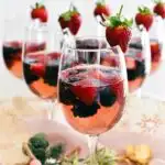 berries in moscato jelly served in wine glasses.