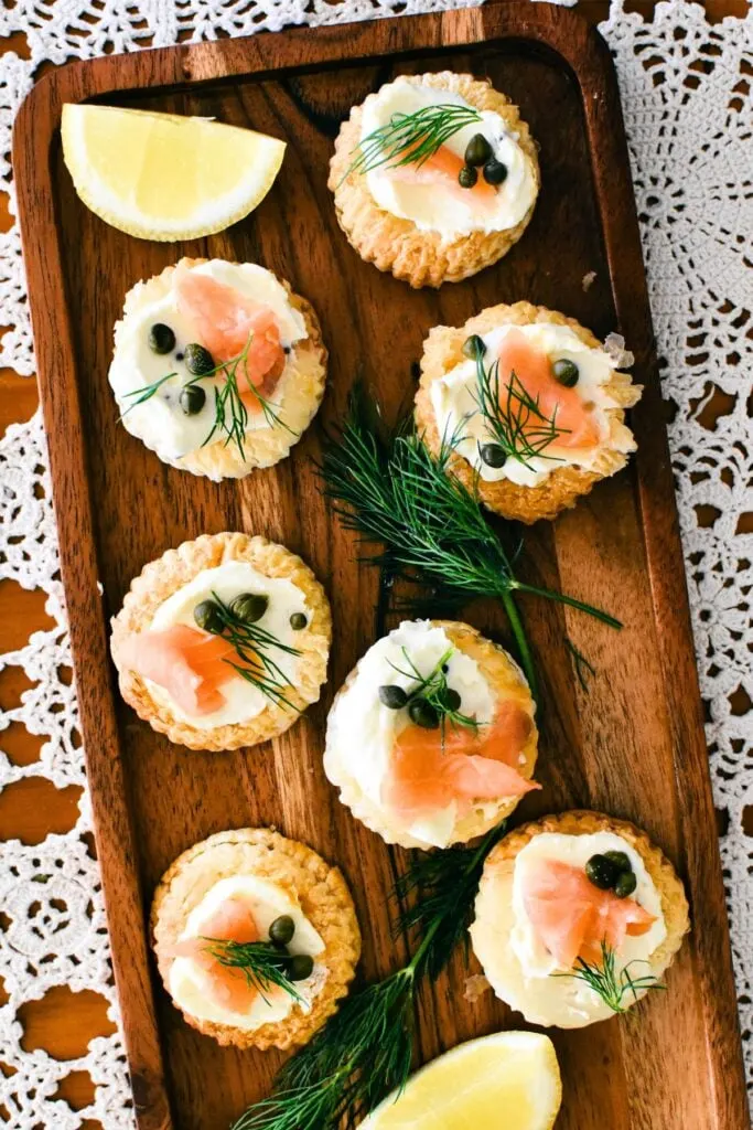 smoked salmon tartlets on tray.