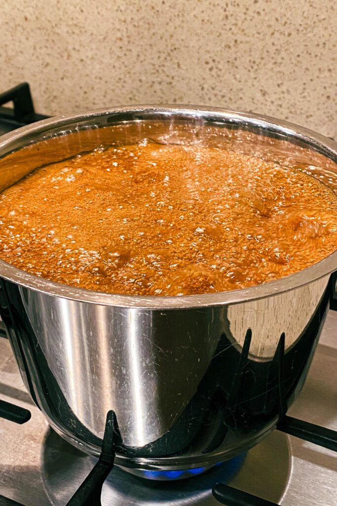 boiling sugar mixture for almond rock.