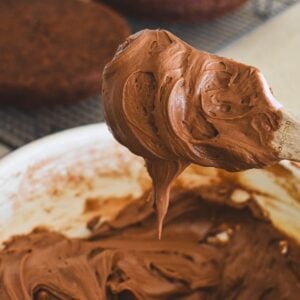 spatula coated in chocolate cake cream cheese icing.