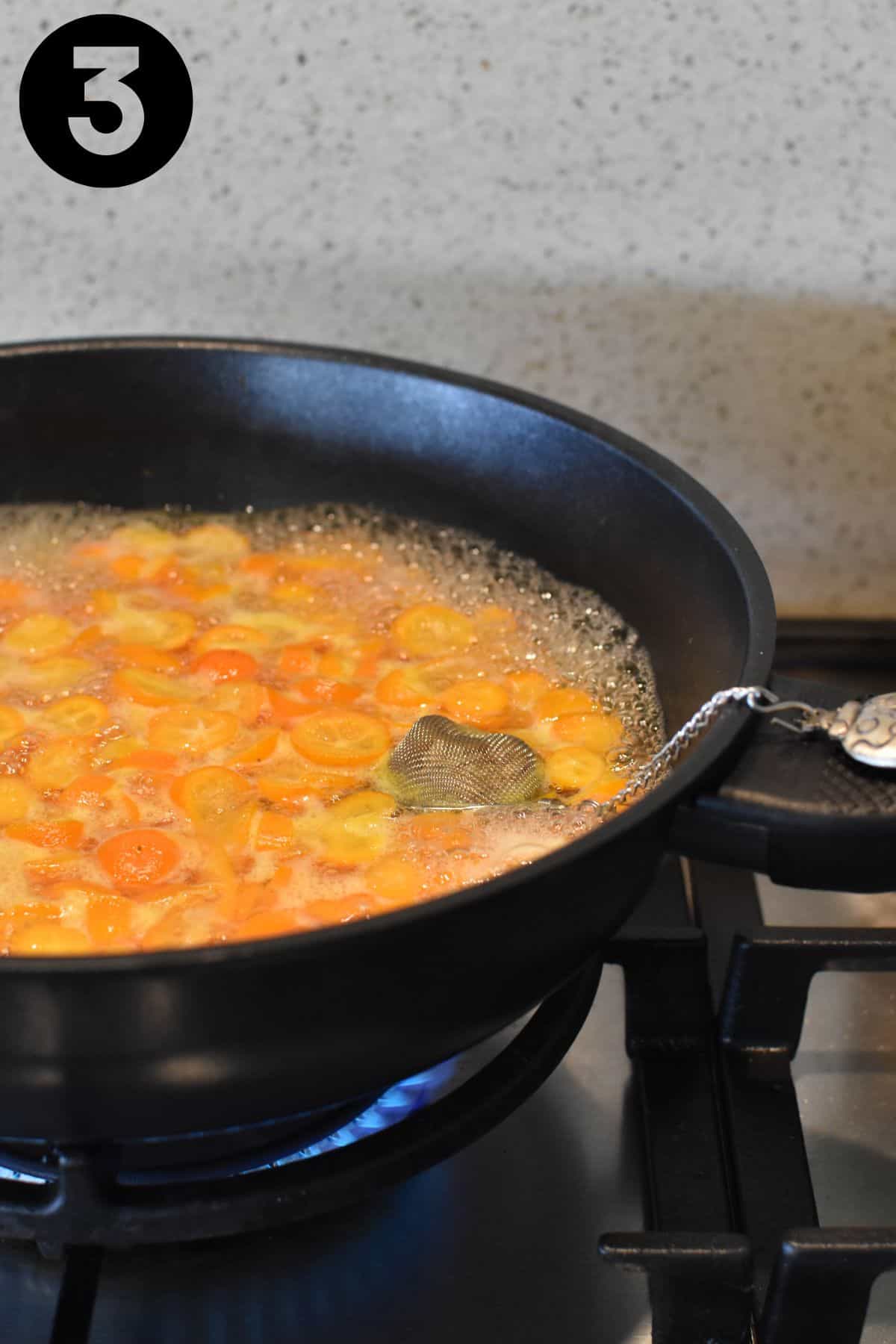 Boiling kumquats and water