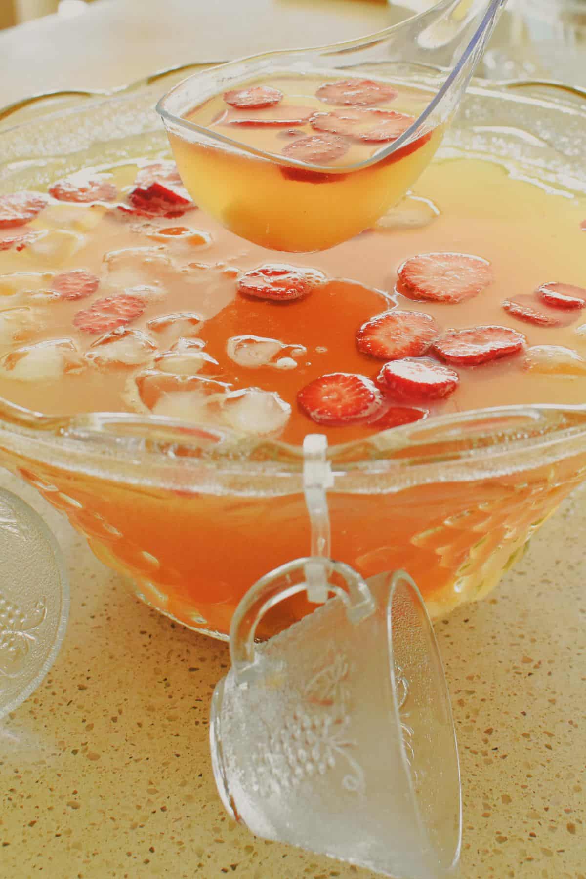 Scooping Fruit Punch.