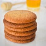 Honey Snaps Biscuits stacked on plate.