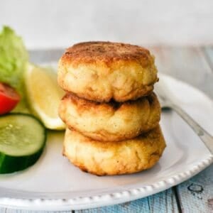Tuna Patties piled on plate.