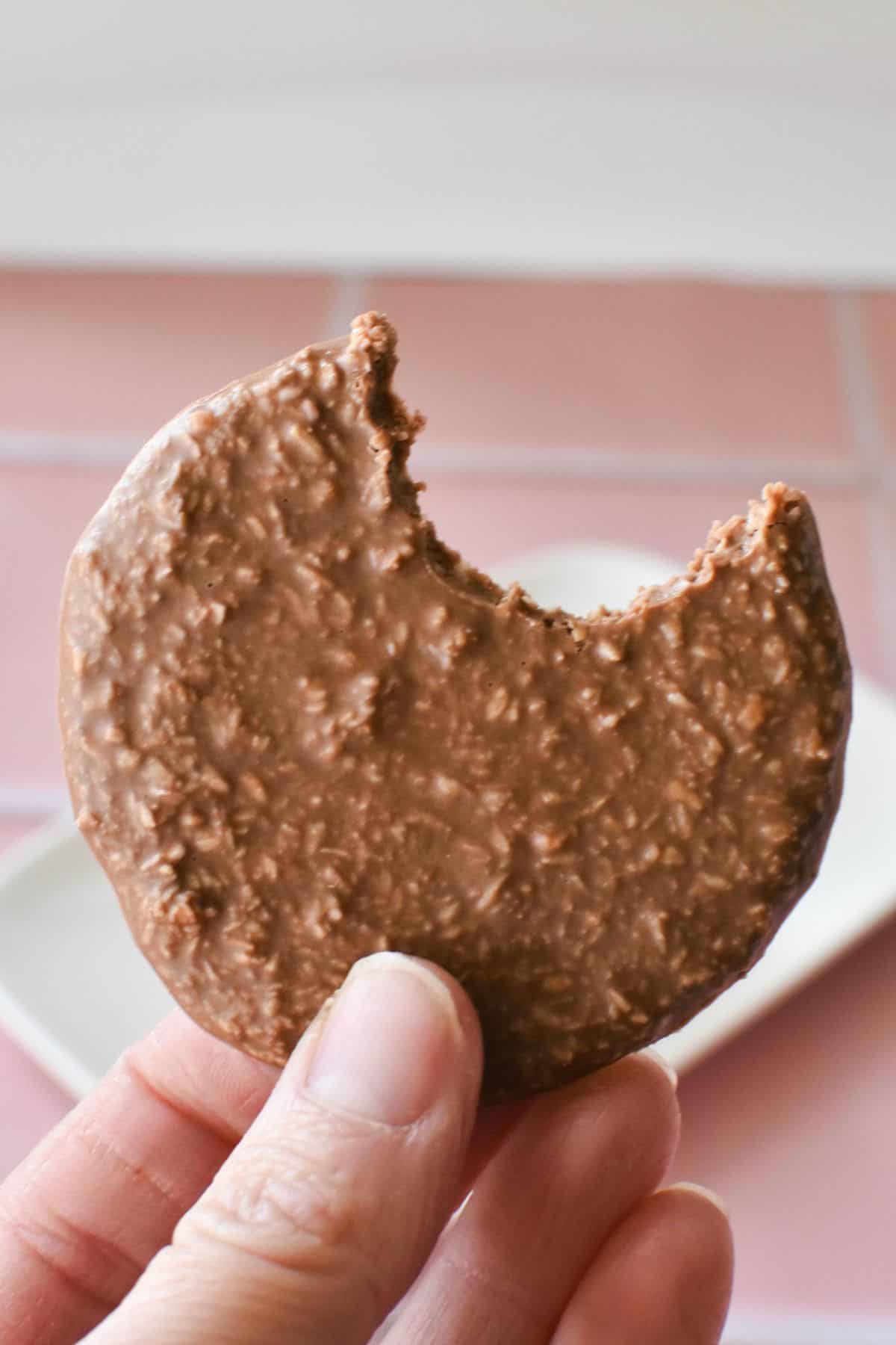 Close up of a Coconut Rough with a bite taken out of it.