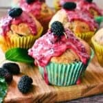 Mulberry Muffins on wooden board.
