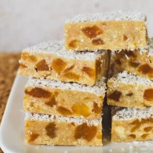 Apricot Slice stacked on a plate.