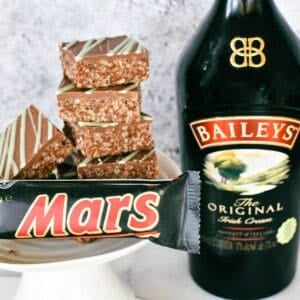 Baileys Mars Bar Slice stacked on plate.