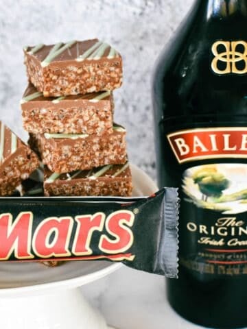 Baileys Mars Bar Slice stacked on plate.