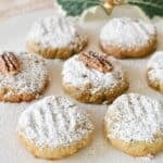 Pecan Biscuits dusted with icing sugar.