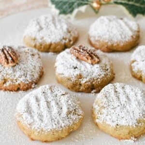 Pecan Biscuits dusted with icing sugar.