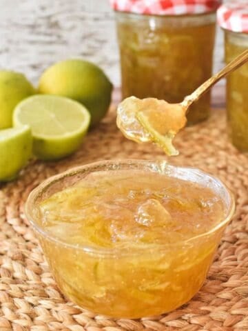 Lime Marmalade in glass serving dish.